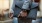 man in a business suit with a pouch
