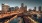 a city with a river and boats