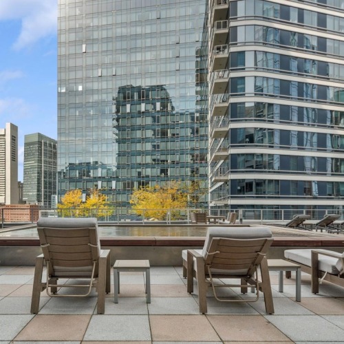 lounge chairs around a reflecting pool